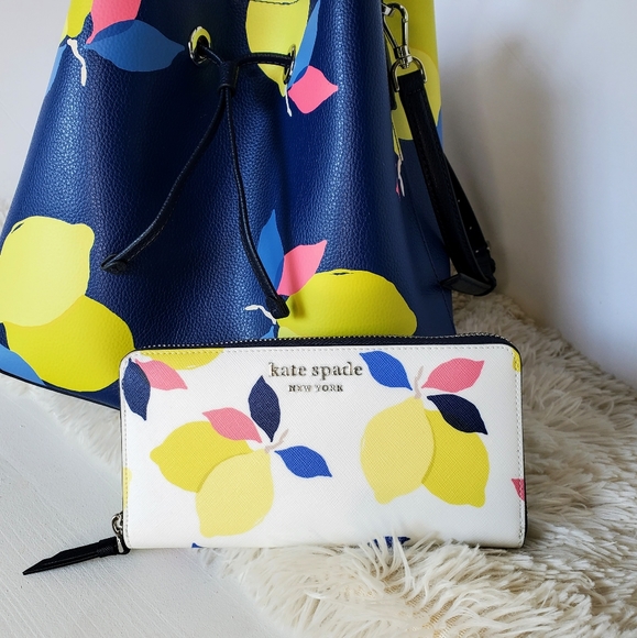 kate spade Handbags - Kate Spade Lemon Zest Continential Wallet